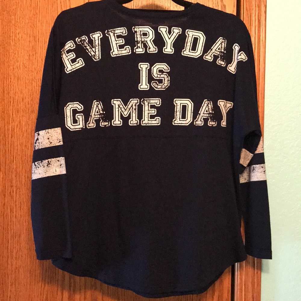 Navy blue long sleeve shirt.